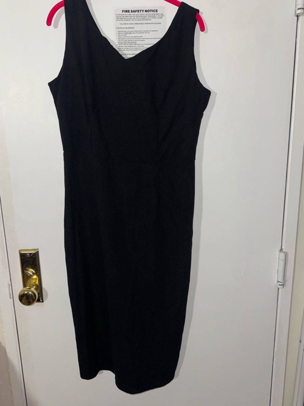 Classic Black Sleeveless Sheath Dress